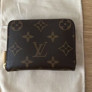 Louis Vuitton coin wallet in monogram design